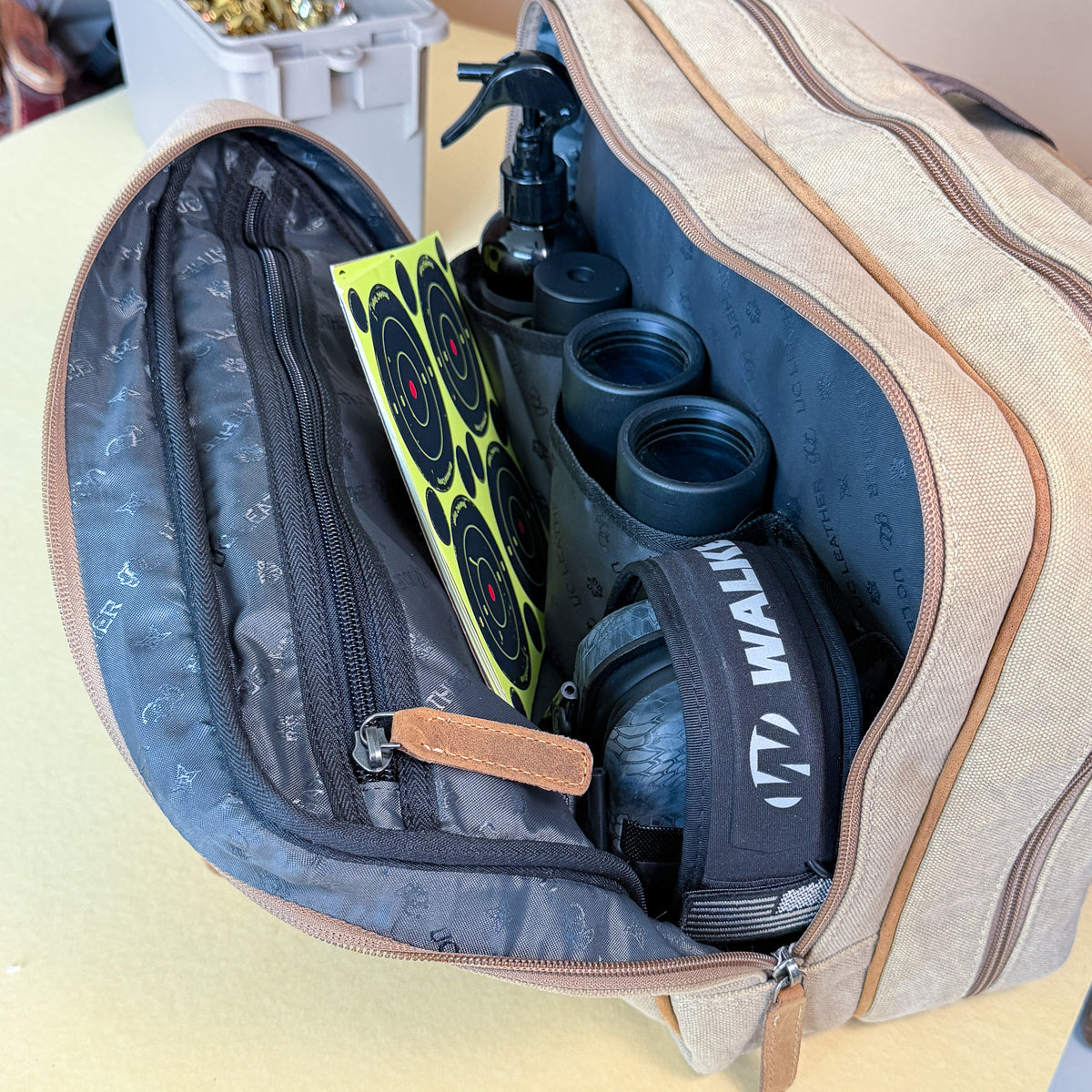 Open back zipper pocket of the UC Leather Small Range Bag with three large organizer pockets and a zip compartment